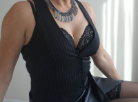 Louise Payn, classy mature Domme, confident, ready to guide you on your submissive journey. - Louise